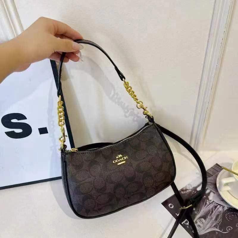 Signature Baguette Crossbody Bag