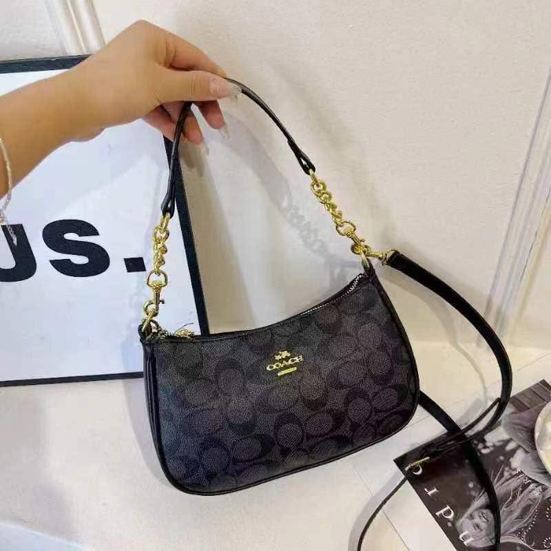 Signature Baguette Crossbody Bag