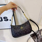 Signature Baguette Crossbody Bag