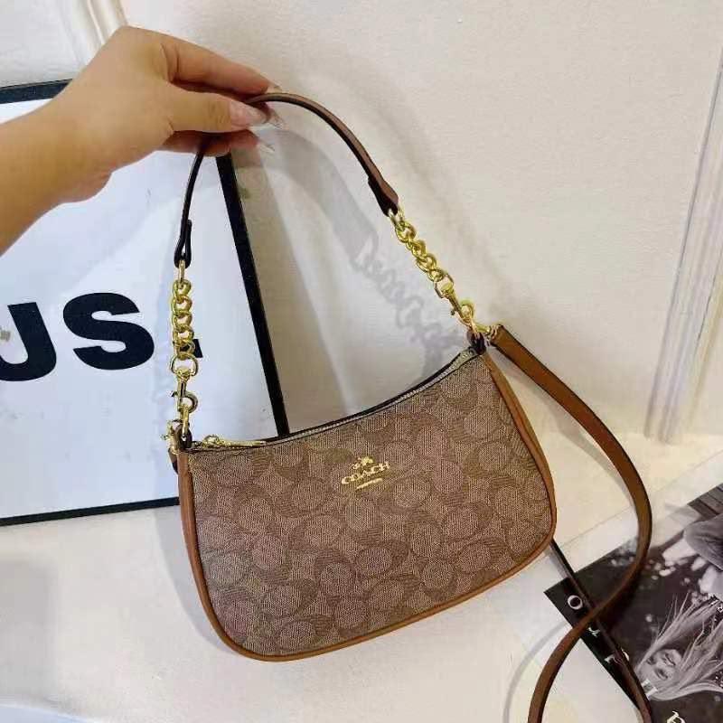 Signature Baguette Crossbody Bag