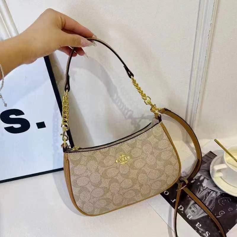 Signature Baguette Crossbody Bag