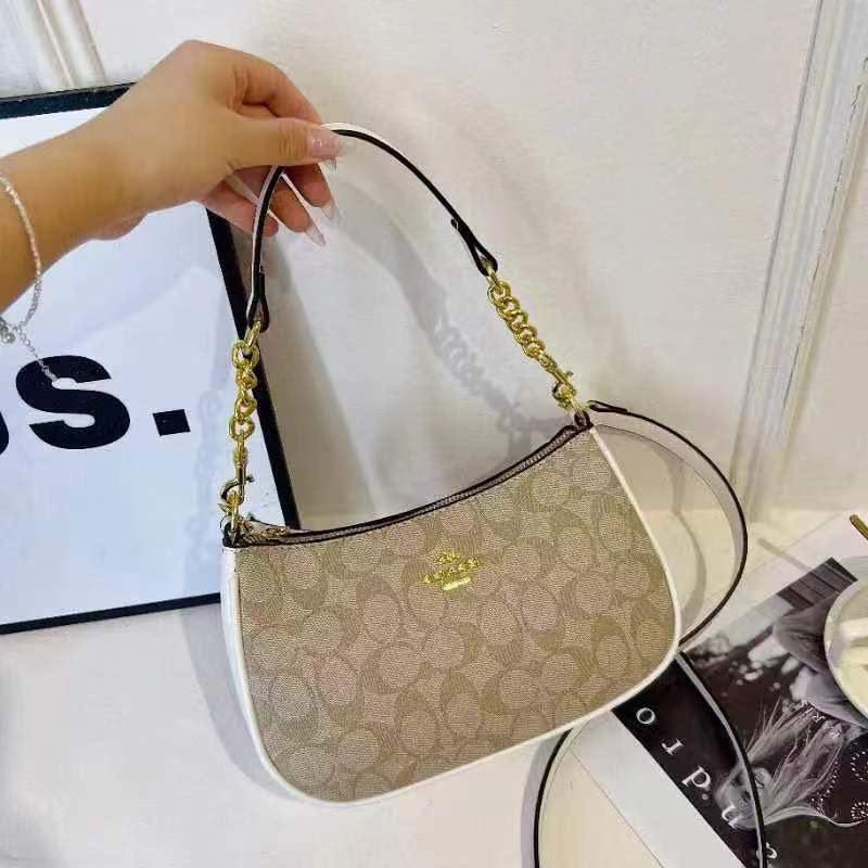 Signature Baguette Crossbody Bag