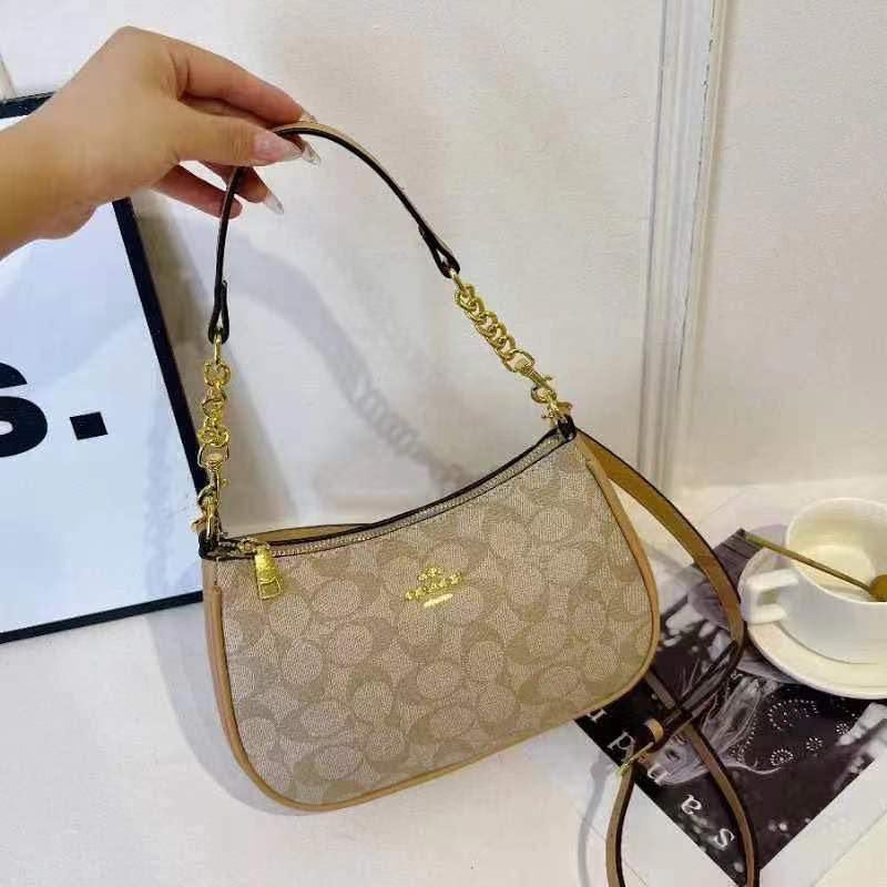 Signature Baguette Crossbody Bag