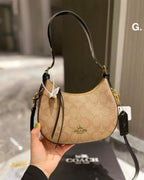 Curved Signature Hobo Bag