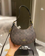 Curved Signature Hobo Bag