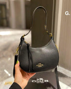 Curved Signature Hobo Bag