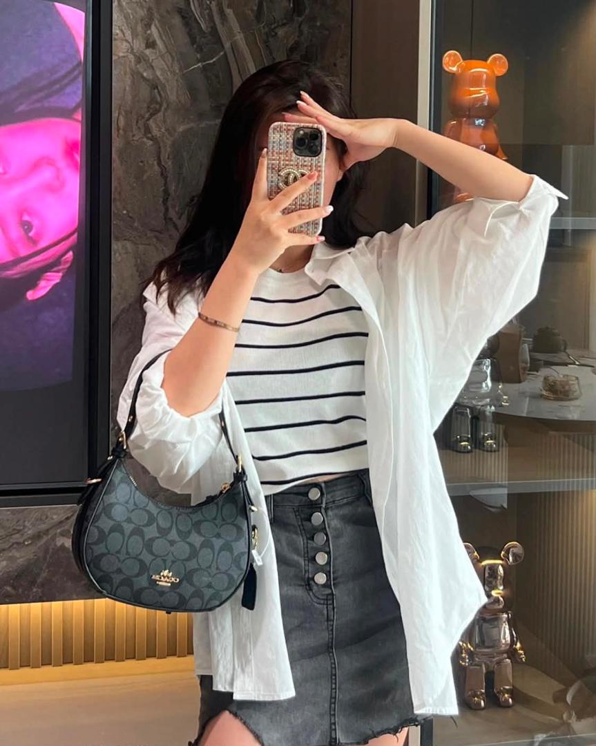 Curved Signature Hobo Bag