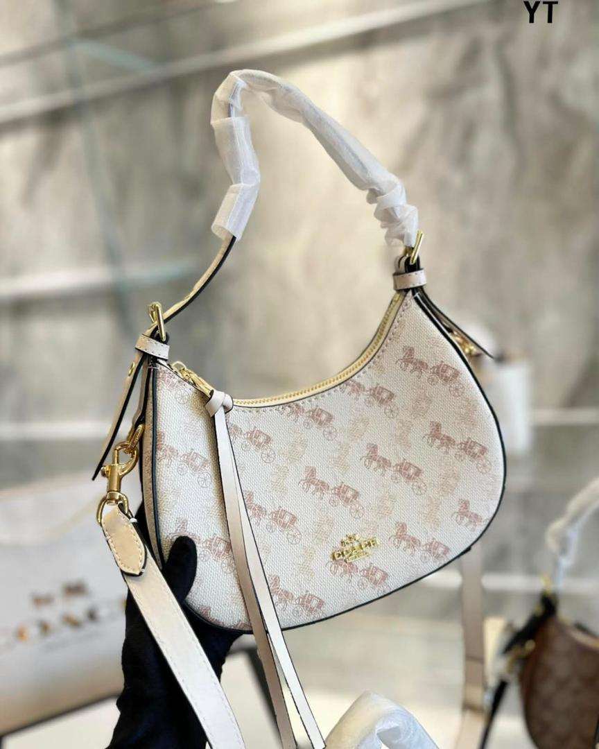 Curved Signature Hobo Bag