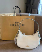 Curved Signature Hobo Bag